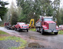 Culvert Set with a shot of a World Excavating dump truck